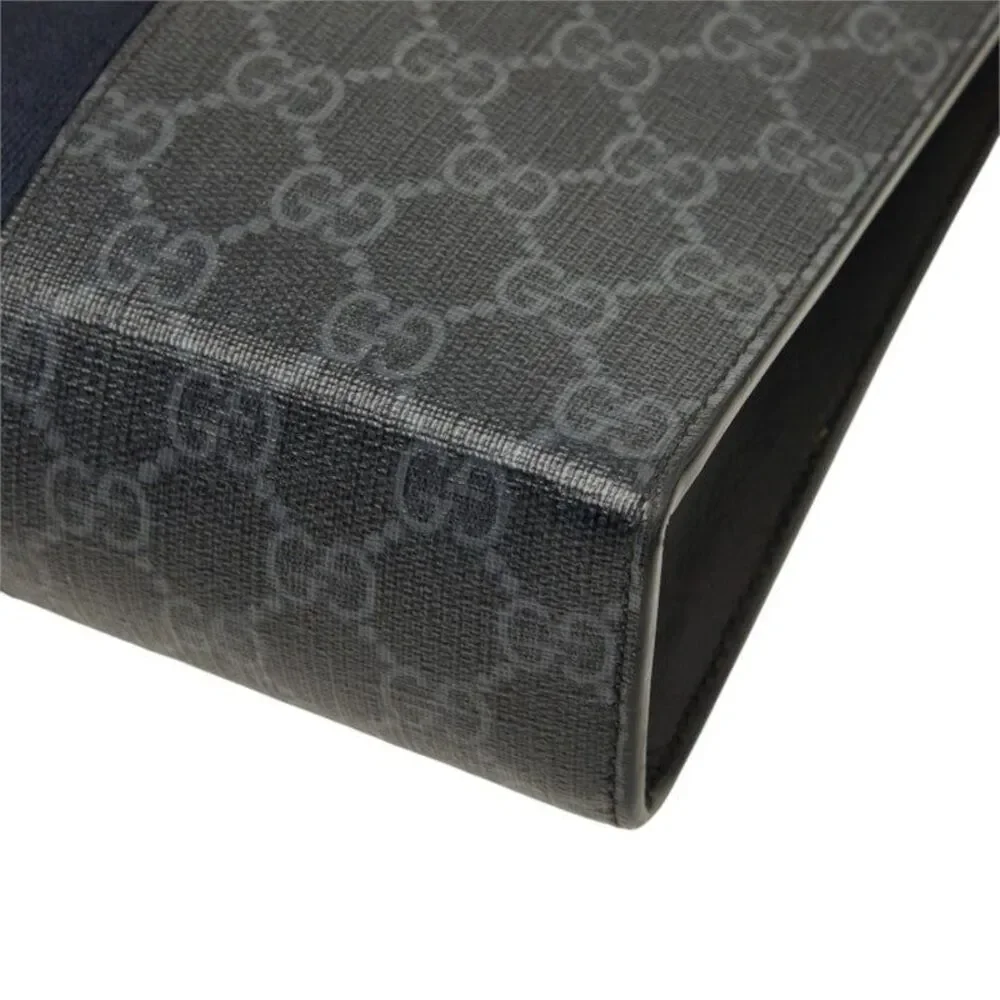 Gucci GG Supreme Clutch Bag